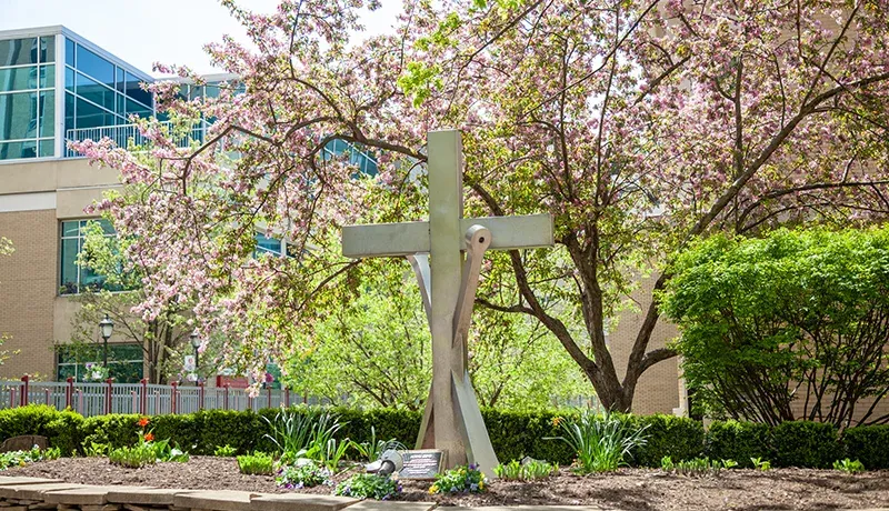 holy cross cross and anchor sculpture